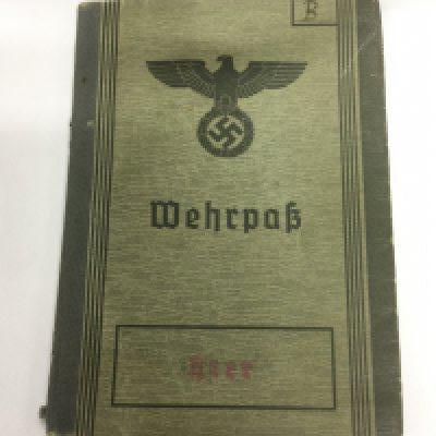 A Third Reich service book. Shipping category A.