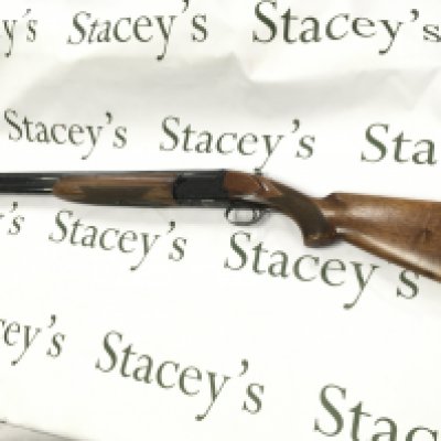 A Military Early 19th Century breast plate surmounted its a winged bird and inscription. 15cm wide.