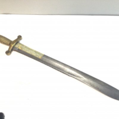 A Russian Crimean War Pioneers Tesak Model 1847 short sword with a sawback edge brass grip of Roman inspiration. No scabbard.