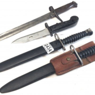 Two Swiss 1957 pattern bayonets one with a leather frog and Russian Klashnekoff bayonet and one other bayonet (4)
