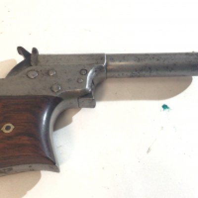 A Rare American Remington .41 Caliber Rim Fire Vest Pocket Deringer Pistol. Circa 1860 these where produced in low numbers the top of the action with Remington and Patient dates Oct 1 1861 serial number possible 861