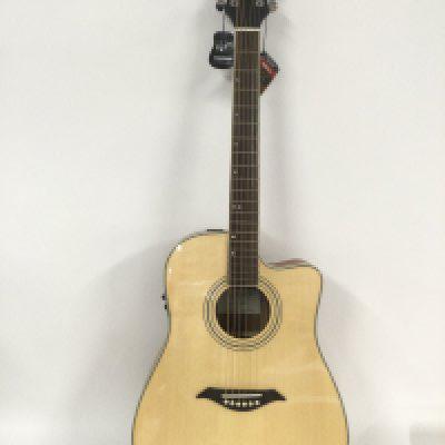 A brand new hand built Turner 40CE electro acoustic guitar with original retail box.