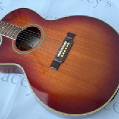 A left handed Washburn Festival Series Electro Acoustic Guitar sunburst finish. Overall good condition. No case.  Click Here to Register to bid