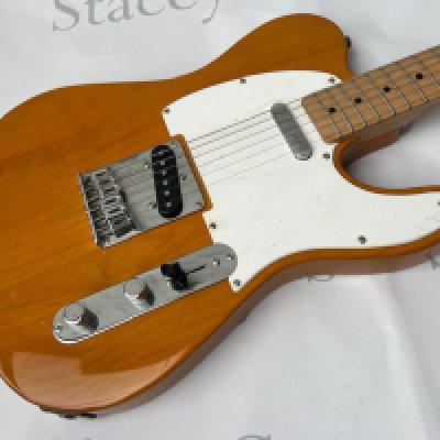 Squier Telecaster solid body electric guitar - made in China Natural finish with chrome parts. In good to very good condition. Very little evidence of any playwear. No marks, damage or fretwear.