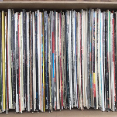 A box of LPs and 12" singles plus two record cases of 7" singles by various artists including INXS, Prince, Deep Purple, Genesis and many more.