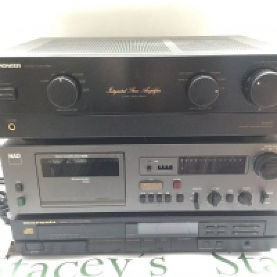 A Pioneer A400 amplifier, a NAD 6340 cassette deck and a Marantz CD65 ii CD player (3).