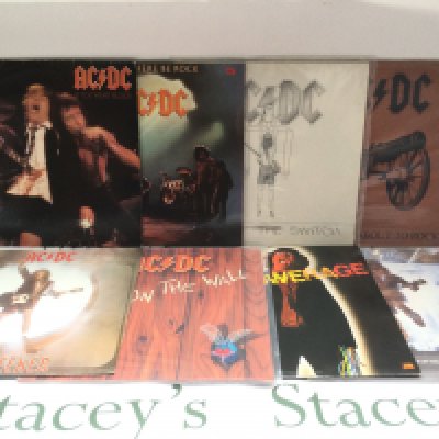 Seven AC/DC LPs and a 12" single comprising 'Powerage', 'Flick Of The Switch' and others.