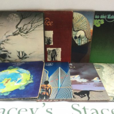 Two bags containing 16 prog rock LPs by various artists including Yes, ELP, Badger and others.