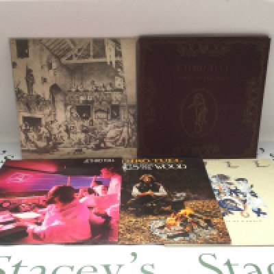 Five Jethro Tull LPs comprising 'Living In The Past', 'Minstrel In The Gallery' and others.