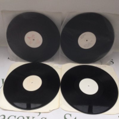 Four Depeche Mode 12" white label promo discs comprising 'Stripped', 'A Question Of Time', 'Never Let Me Down Again' and 'Shake The Disease'.