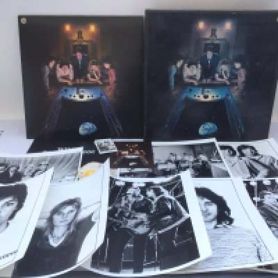 A Wings 'Back To The Egg' promotional pack containing the LP, 8 publicity photos with captions affixed to the reverse, five tea cards, sticker and postcard.