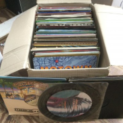 A box of mainly disco and soul 12" singles by various artists including promotional discs. Please note some covers are water damaged.