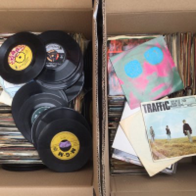 Four boxes of 7" singles and EPs by various artists including The Beatles, Small Faces, Prince and many more.