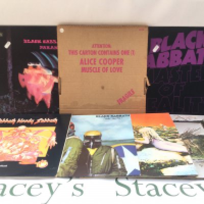 Seven hard rock LPs by Led Zeppelin, Black Sabbath and Alice Cooper.