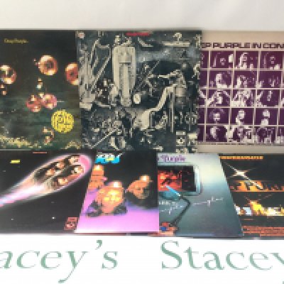 Seven Deep Purple LPs comprising 'Who Do We Think We Are?', 'Fireball' and others. Includes a promo copy of 'Deep Purple'.