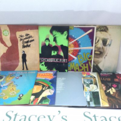 Two bags containing 20 rock and new wave LPs and 12" singles by various artists including Dr Feelgood, Roxy Music, Be Bop Deluxe and others. Includes a Roxy Music promo disc.