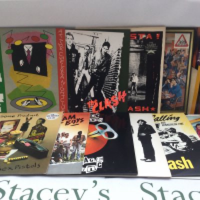 Two bags containing 21 punk rock LPs and 12" singles by various artists including Sex Pistols, The Clash, Buzzcocks and others. Includes two promo LP by The Tubes and The Dickies.