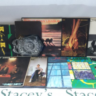 Two bags containing 20 post punk and new wave LPs and singles by various artists including The Jam, Secret Affair, Echo & The Bunnymen and others. Includes a Klark Kent promo disc.