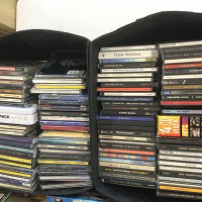 Two boxes of CDs by various artists including Pink Floyd, The Who, Adele and many more (2).