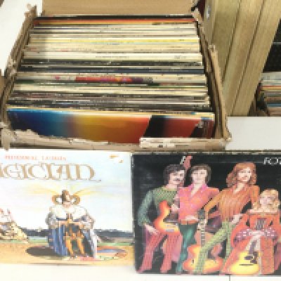 A box of LPs by various artists including Fotheringay, Elvis Presley and others.