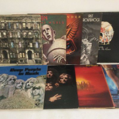 Ten rock LPs by various artists including Queen, Deep Purple, Uriah Heep and others.
