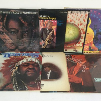 Two bags containing 25 jazz LPs by various artists including Miles Davis, Herbie Hancock, Coleman Hawkins and others.