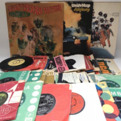 Three LPs by Ten Years After, Uriah Heep and Sky & The Family Stone plus a collection of 7" singles by various artists from the 1950s onwards.