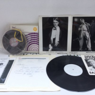 An RCA reissue test pressing of the David Bowie 'Hunky Dory' LP with attached letter on EMI headed note paper, a David Bowie Radio KGB promotional reel plus promotional photos.
