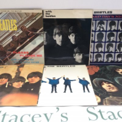 Six Beatles LPs comprising 'Rubber Soul', 'Please Please Me', ''Beatles For Sale' and others, all black and silver Parlophone labels.