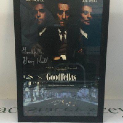 A framed and glazed Goodfellas poster print signed by Henry Hill on who's life the film is based on, approx 31cm x 46.5cm.
