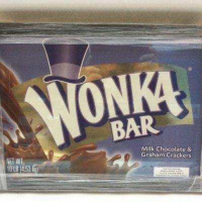 A framed and glazed 10lb Wonka Bar made for the Warner Brothers premiere party in 2005.