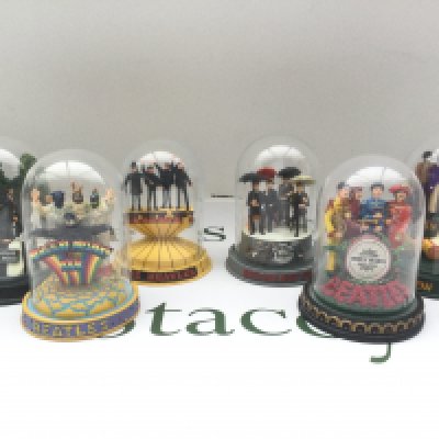 Six Franklin Mint limited edition Beatles figural groups under glass domes, approx height 12cm.