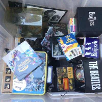 Two boxes of Beatles memorabilia comprising various gift sets, mugs, clock etc.