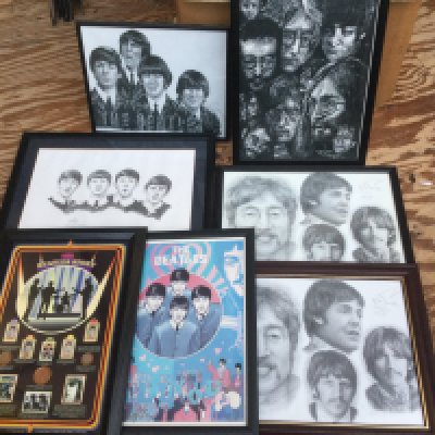 Two boxes of framed and rolled posters of The Beatles including some limited editions.