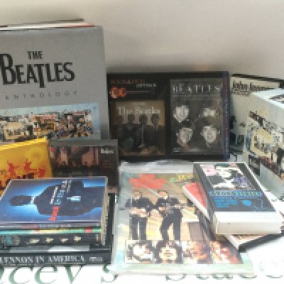 A collection of Beatles ephemera comprising an Anthology DVD box set, books, CDs etc.