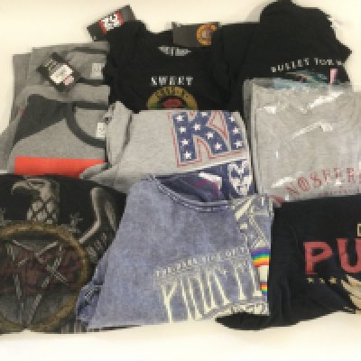 A collection of music T shirts for various acts including Deep Purple, Kiss, Pink Floyd and others plus a Guns n Roses baby grow.
