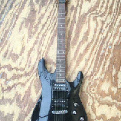 A Schecter Black Hawk BC-1 electric guitar. No case.