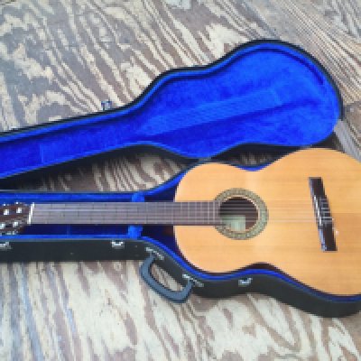A vintage Antonio Lorca classical guitar and accessories. Comes with a hard carry case.