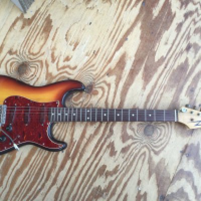 A scratch built Strat style electric guitar fitted with three Seymour Duncan active pickups and a drop D tuner. No case.