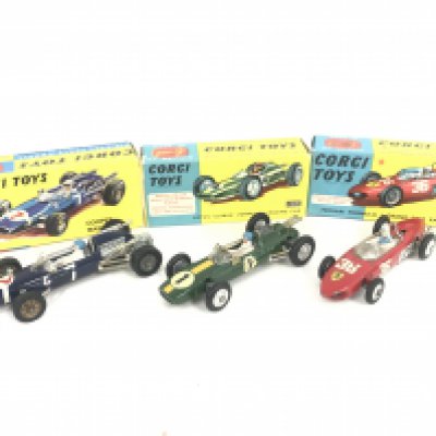 3 X Boxed Corgi F1 Cars. A Cooper Maserati #156. A Lotus-Climax #155 and a Ferrari #154.