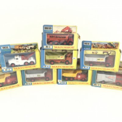 A Collection of Boxed Matchbox Trucks.
