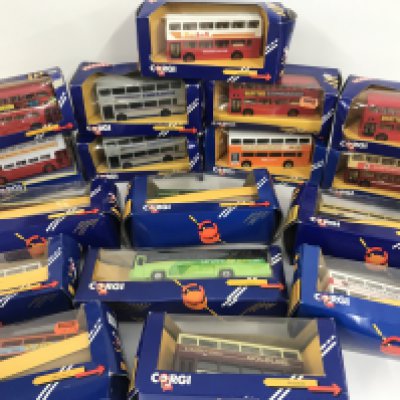 A Collection of Boxed Corgi Buses