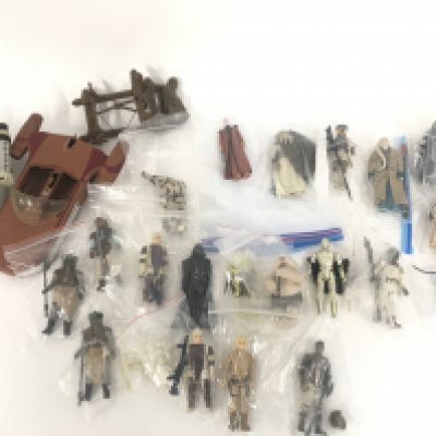 A Collection of Vintage Star War Figures and Spare Parts.