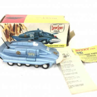 A Boxed Dinky Toys Captain Scarlet Spectrum Pursuit Vehicle #104. Box Is Worn. No inner sleeve.