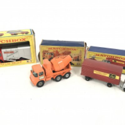 A Boxed Matchbox Refuse Truck #K-7. A Ready Mix Concrete Truck #K-19. And an Articulated Freight Truck #M-2. Boxes are Worn.