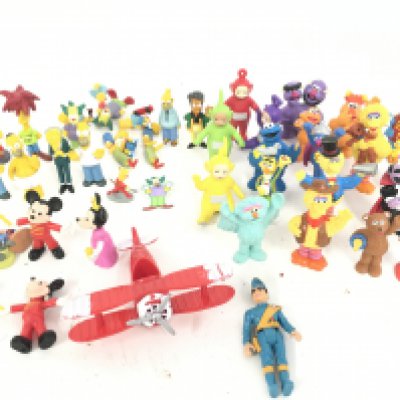 A Collection of Various plastic Figures including The Simpsons. Disney. Sesame Street etc.