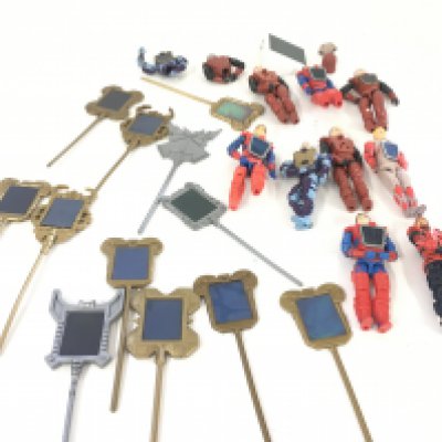 A collection of Visionaries figures and parts