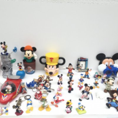 A collection in excess of 40 Disney models mostly relating to Mickey Mouse but also others. Includes, figures..vehicles..key rings etc. ages are variable. NO RESERVE