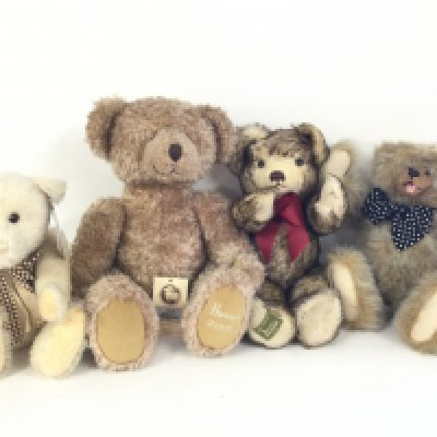 A box containing quantity of sealed McDonalld Tarzan Collectables. Also Merrythought . Lund. Kimberly and Harrods 2002 bears.