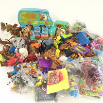 A box containing a quantity of Scooby Doo toys and collectibles.